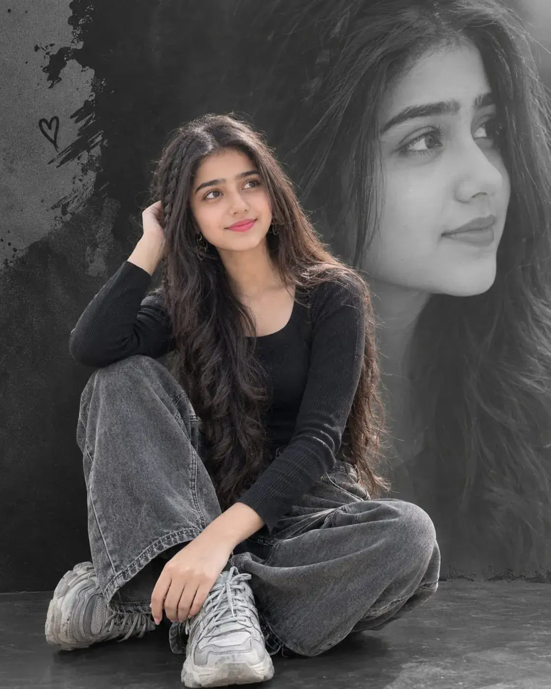 A Beautiful Young Girl Sitting With An Attractive Portrait