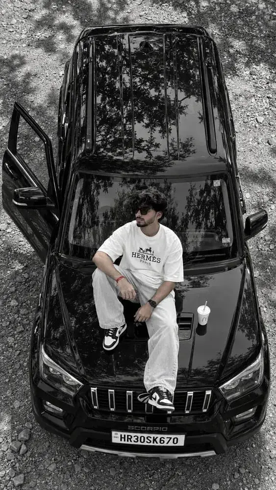 A Stylish Young Man Posing On A Black Scorpio Suv — The Ultimate Luxury Streetwear Aesthetic 🖤🔥