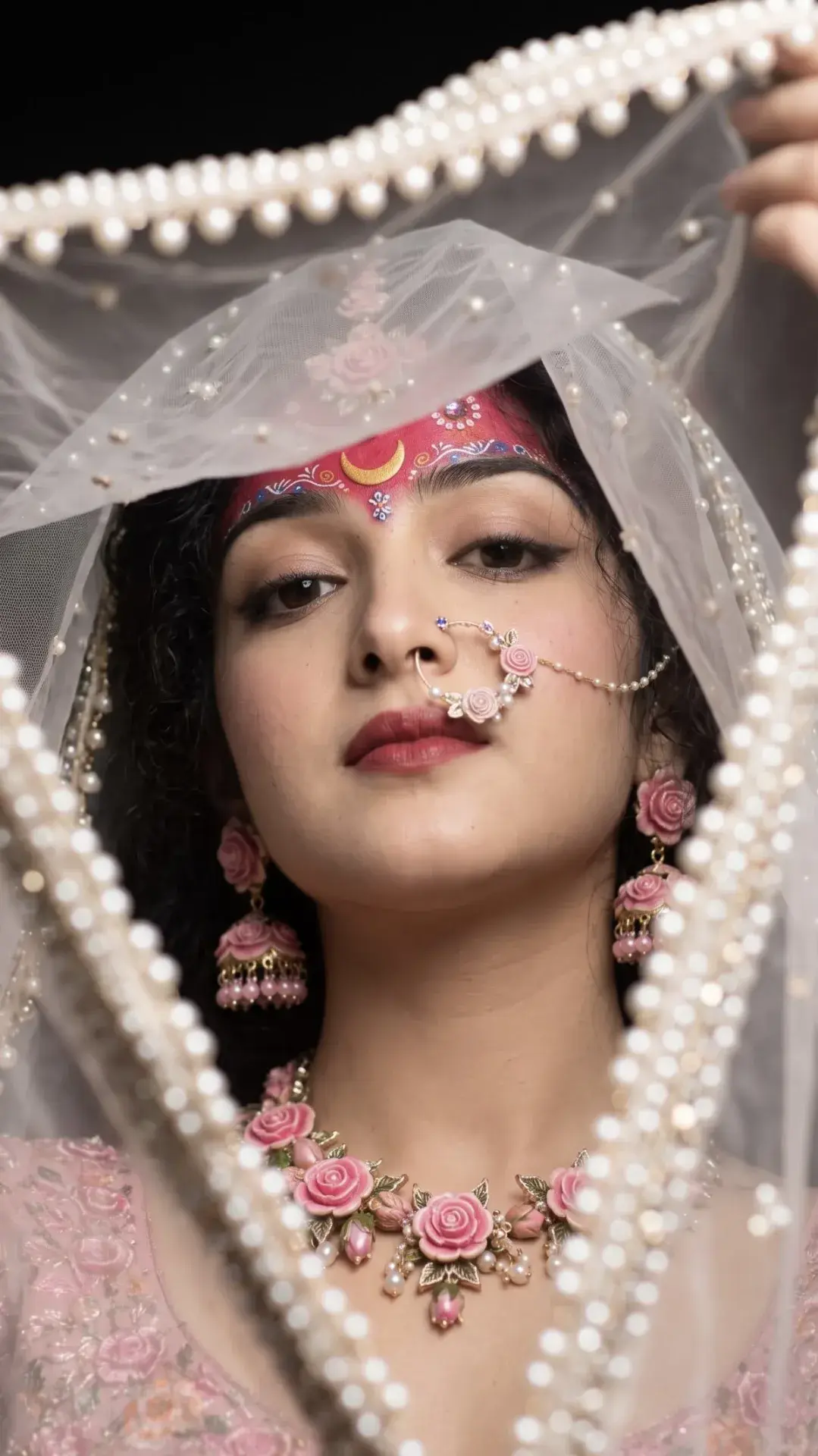 A Woman Adorned In Traditional Indian Attire, Exuding Elegance And Cultural Richness
