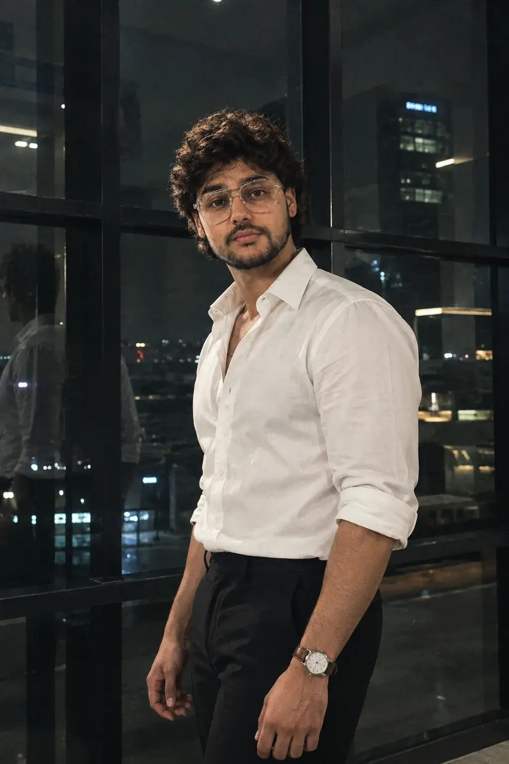 A Young Man Wears A Crisp White Dress Shirt With A Spread Collar.