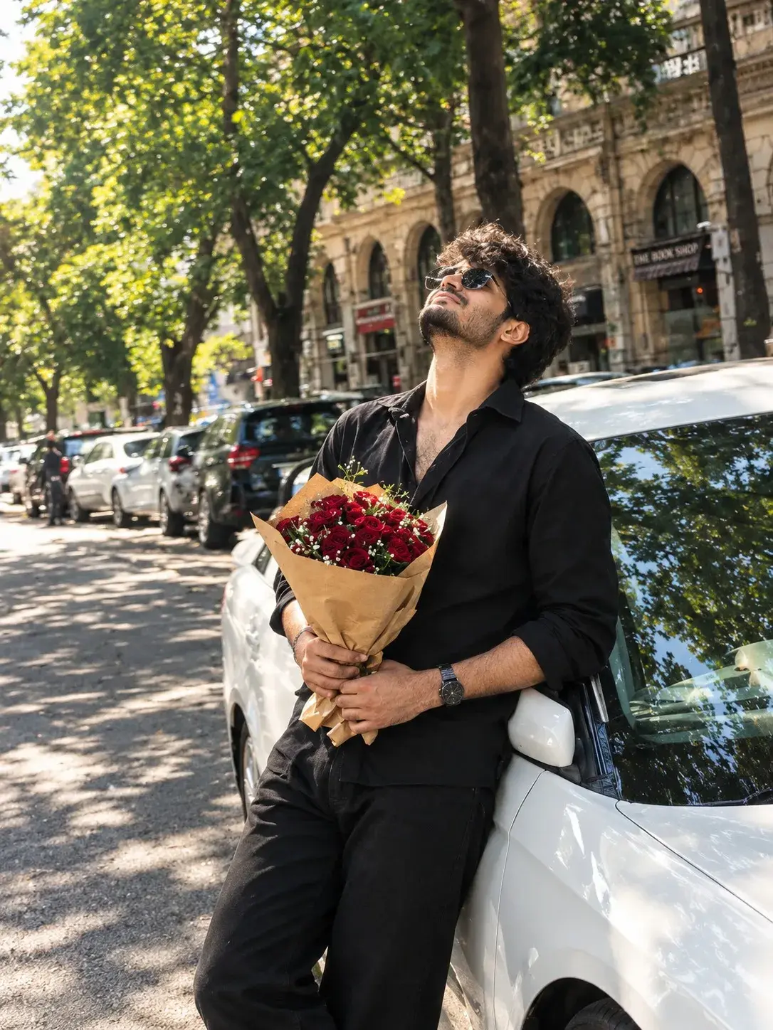 Bouquet Of Deep Red Roses Wrapped In Brown.