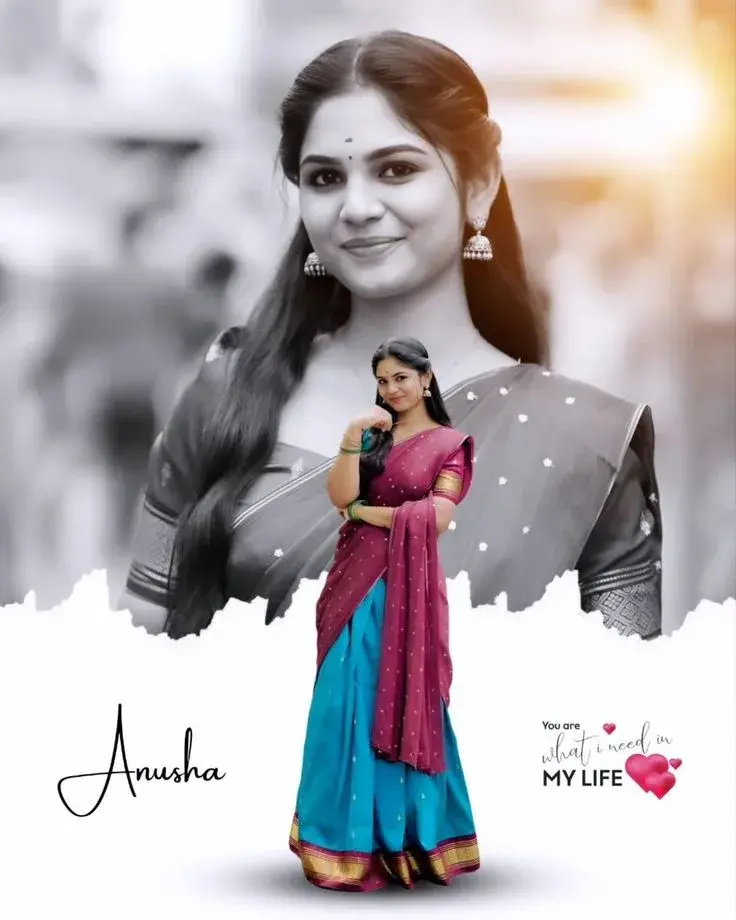 Candid Festive Portrait Of Young South Asian Woman In Magenta Half-Saree With Golden Border