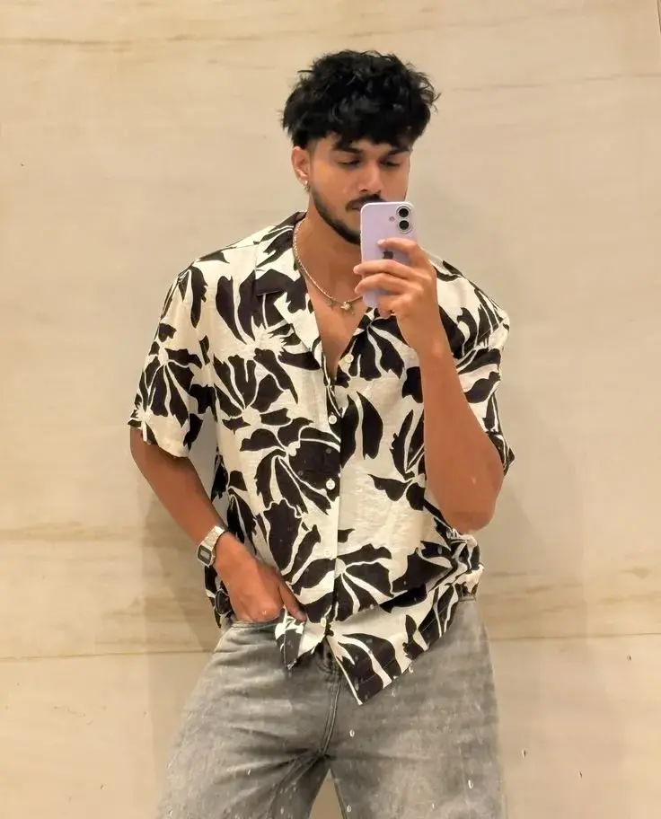 Candid Indoor Mirror Selfie Of Young Indian Man In Floral Shirt