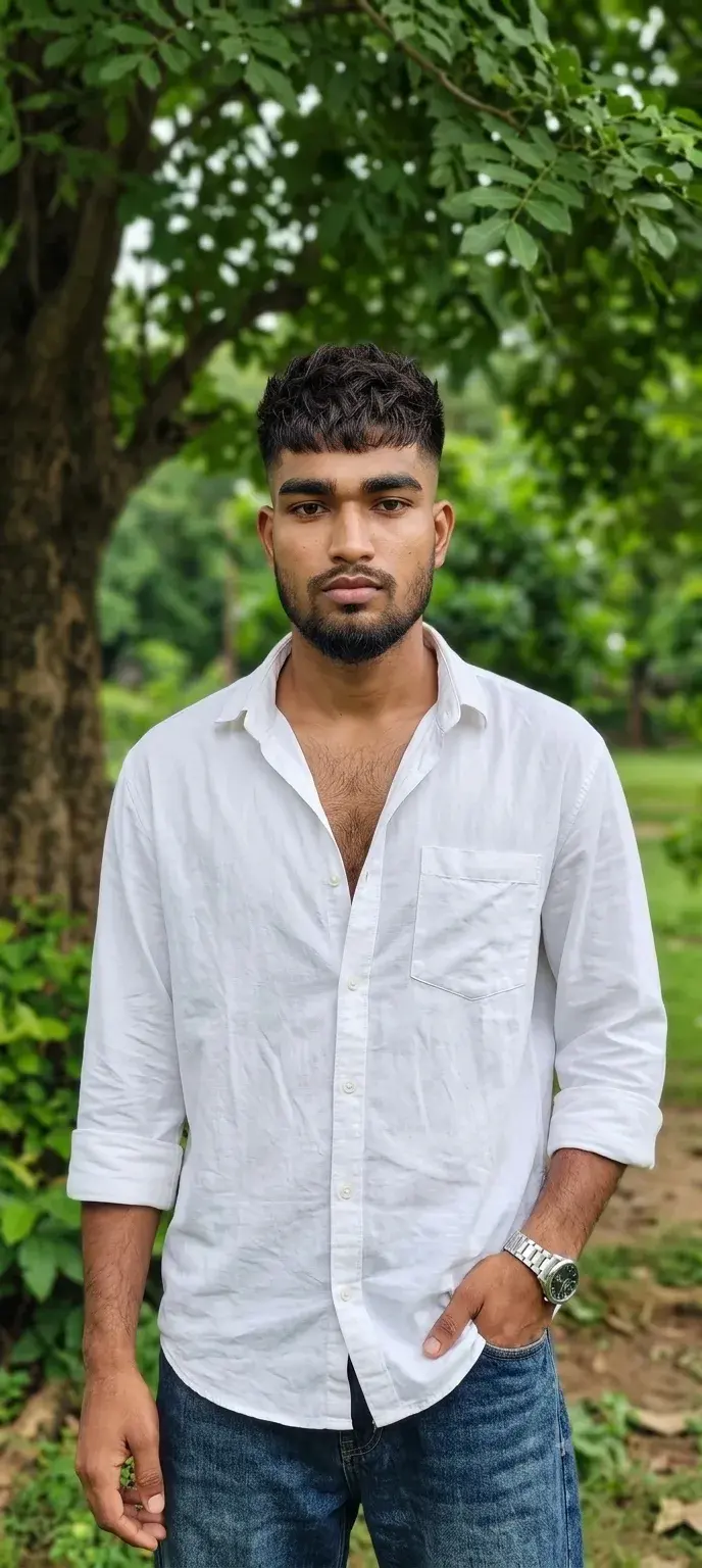 Candid Outdoor Park Portrait Of Young Indian Man In White Linen Shirt