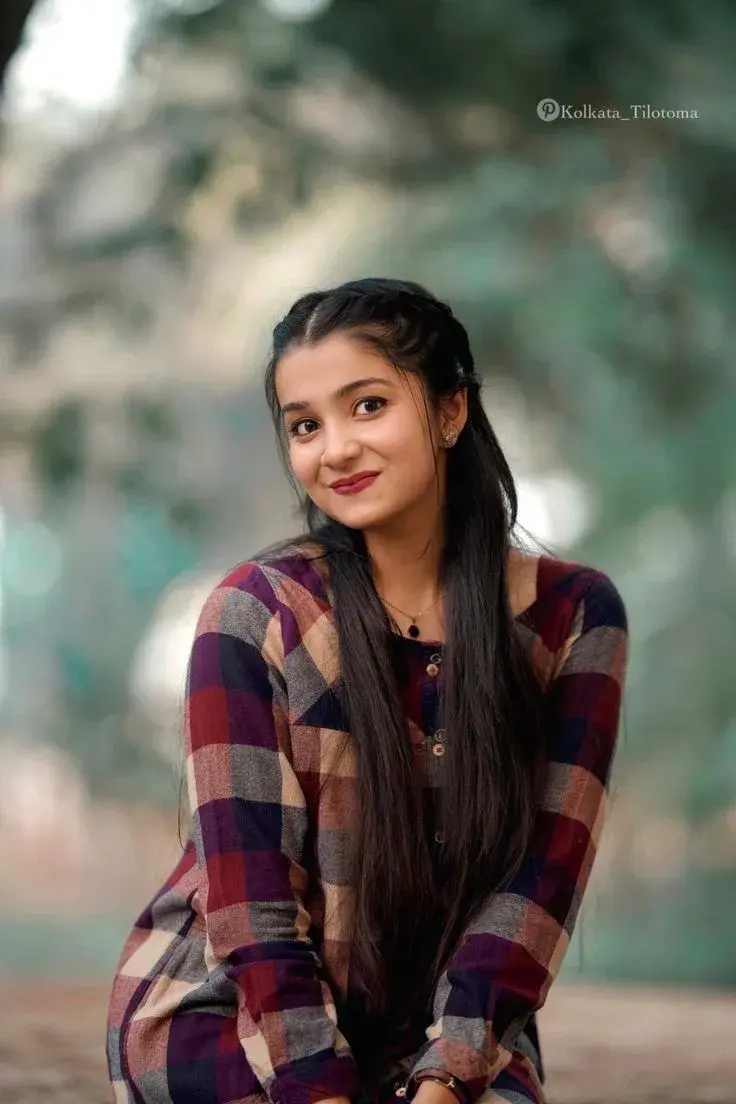 Candid Outdoor Portrait Of Young Indian Woman In Plaid Kurti