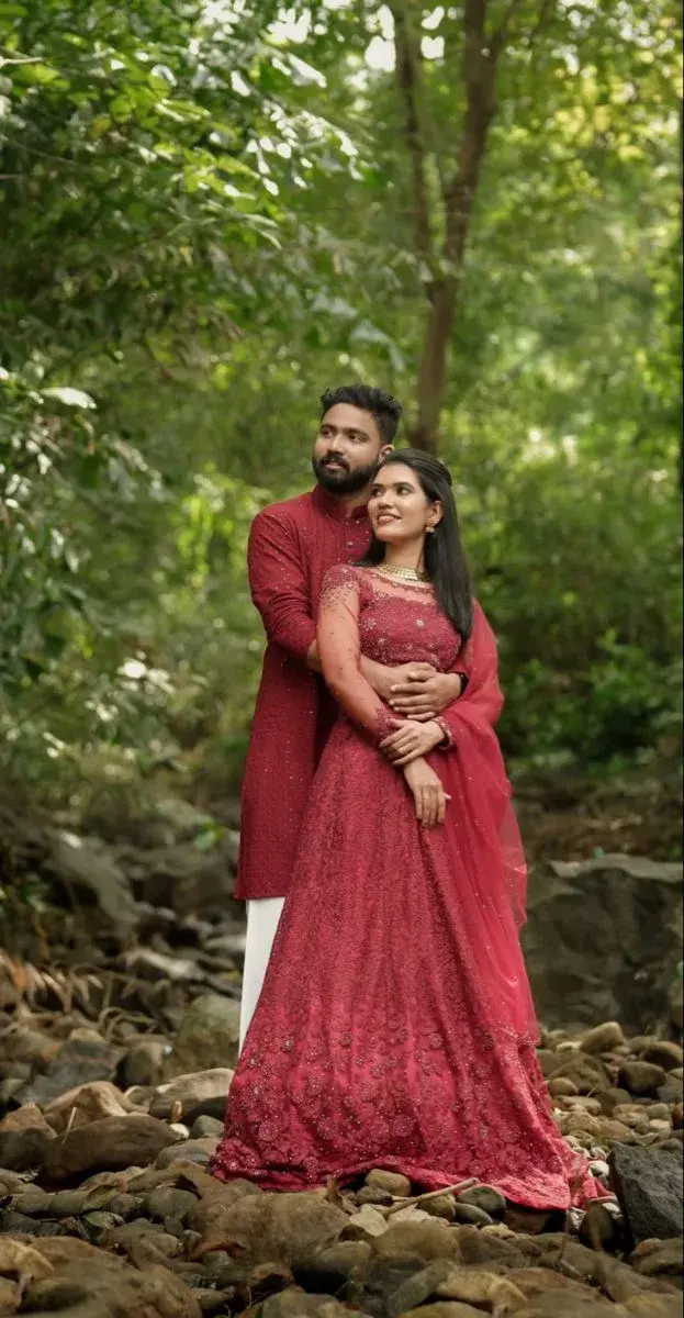 Candid Outdoor Pre-Wedding Portrait Of Indian Couple In Forest Creek