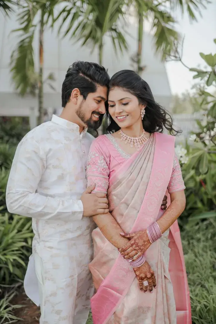 Candid Outdoor Pre-Wedding Portrait Of Indian Couple In Pastel Traditional Attire