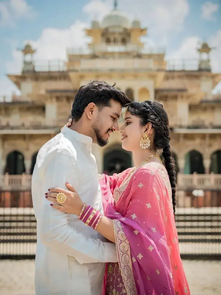 Candid Outdoor Pre-Wedding Portrait Of Young Couple At Historic Palace