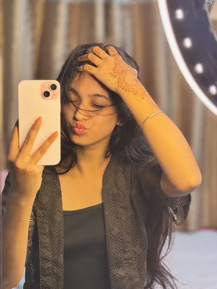 Candid Ring Light Mirror Selfie Of Young Indian Woman Pouting