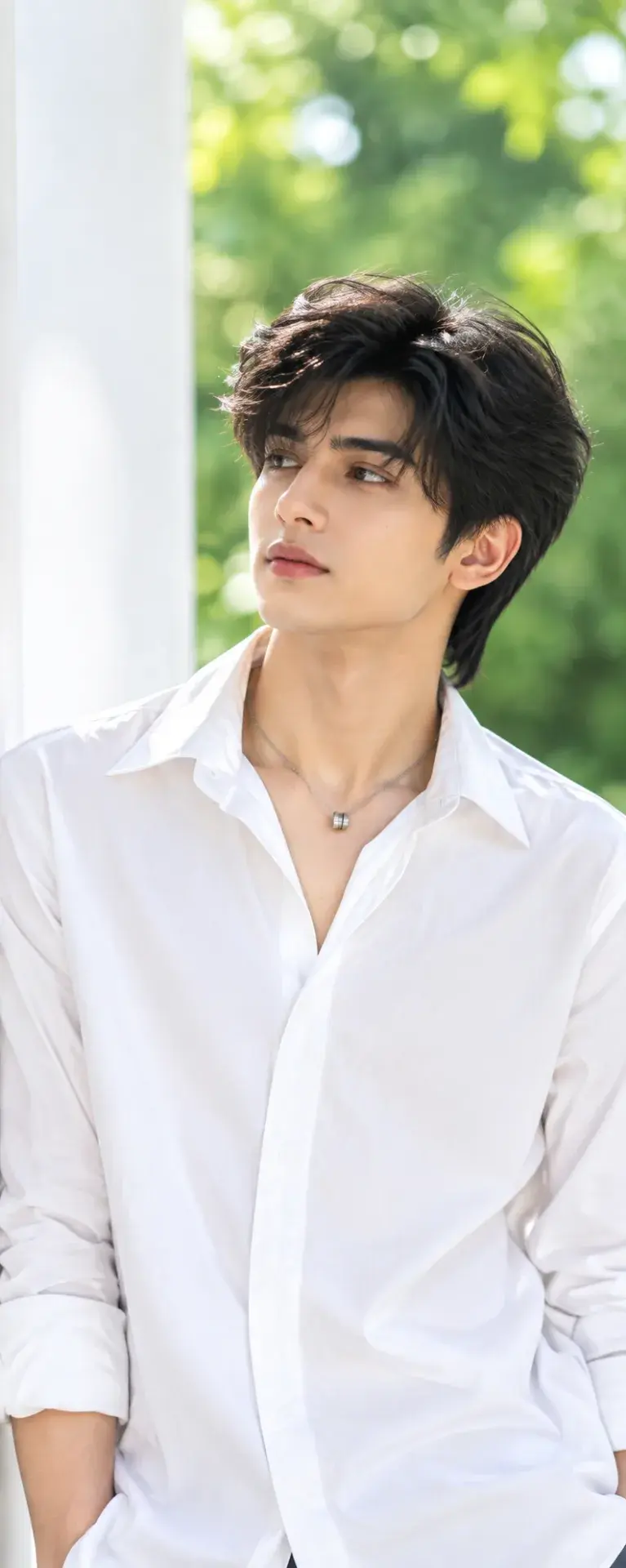 🤍🌿 Clean Male Portrait Photography – White Shirt, Soft Light & Green Bokeh