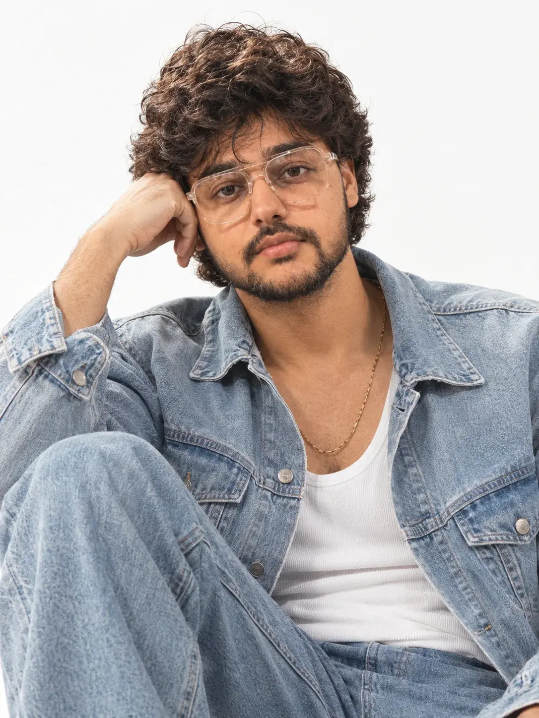 Contemplative Denim Studio Portrait.