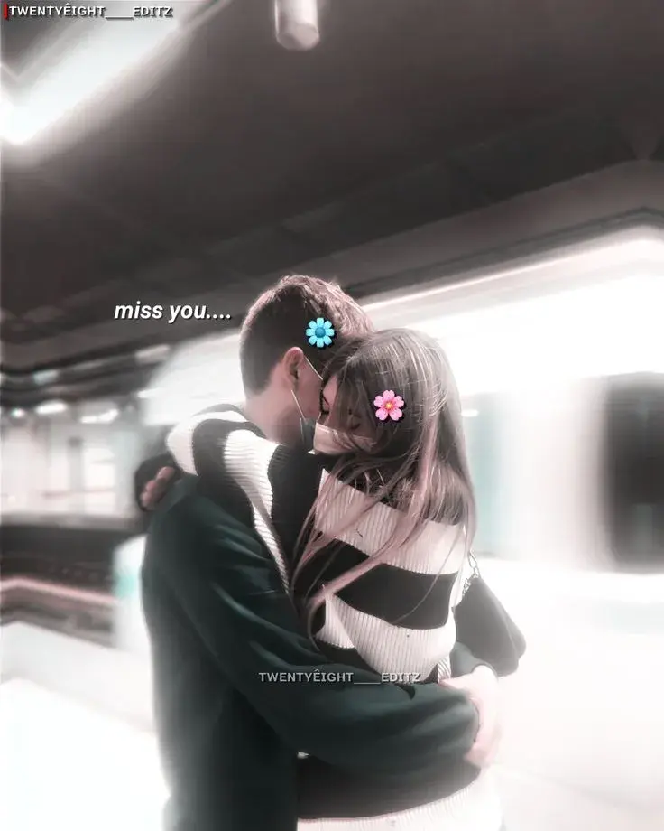 Emotional Candid Hug Between Young Couple On Subway Station Platform