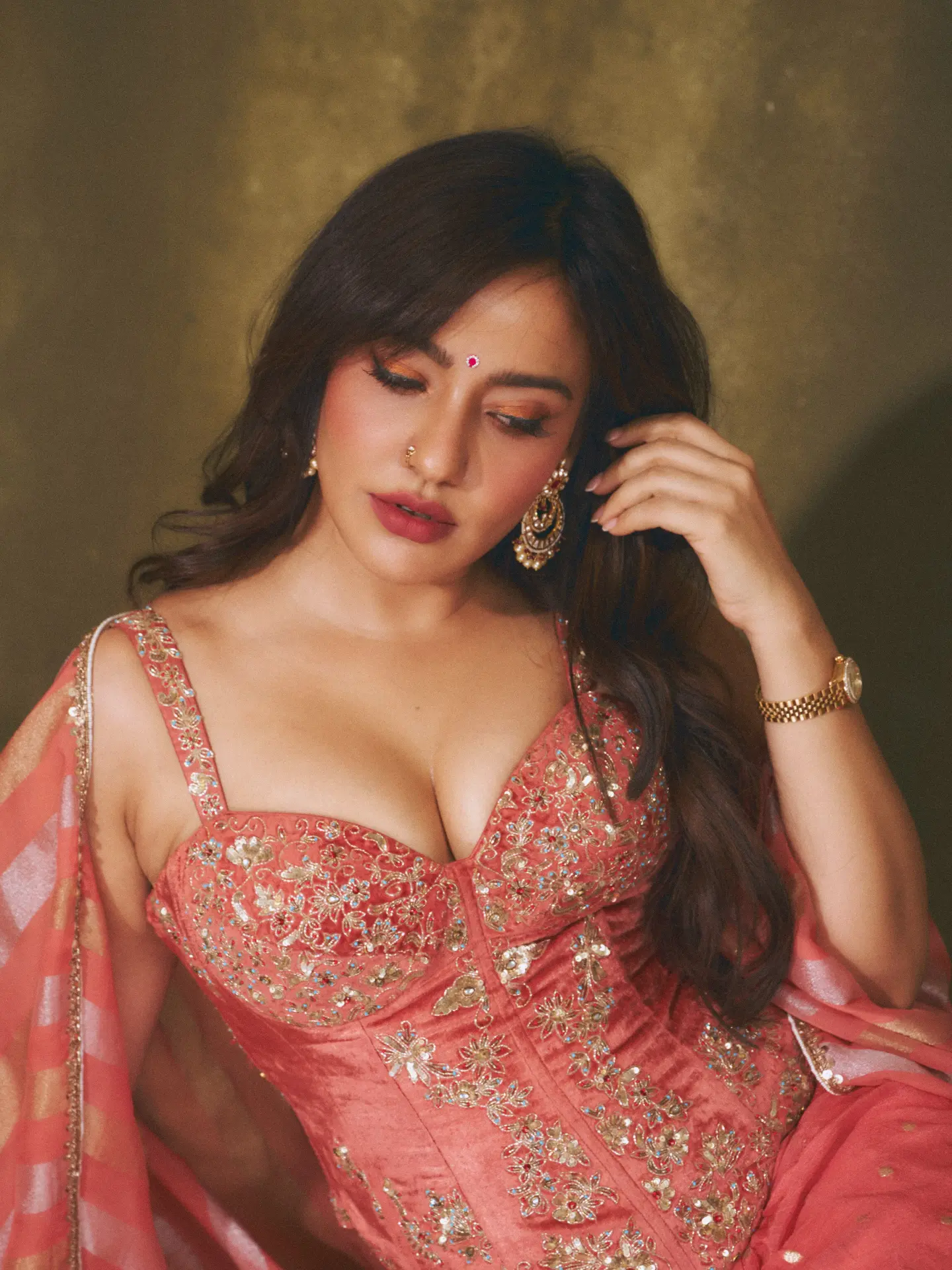 Ethnic Portrait In Traditional Coral Attire