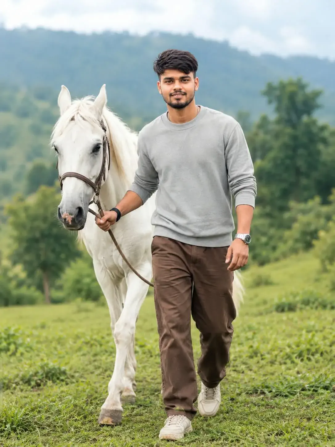 Full-Body Men's Outdoor Portrait With White Horse