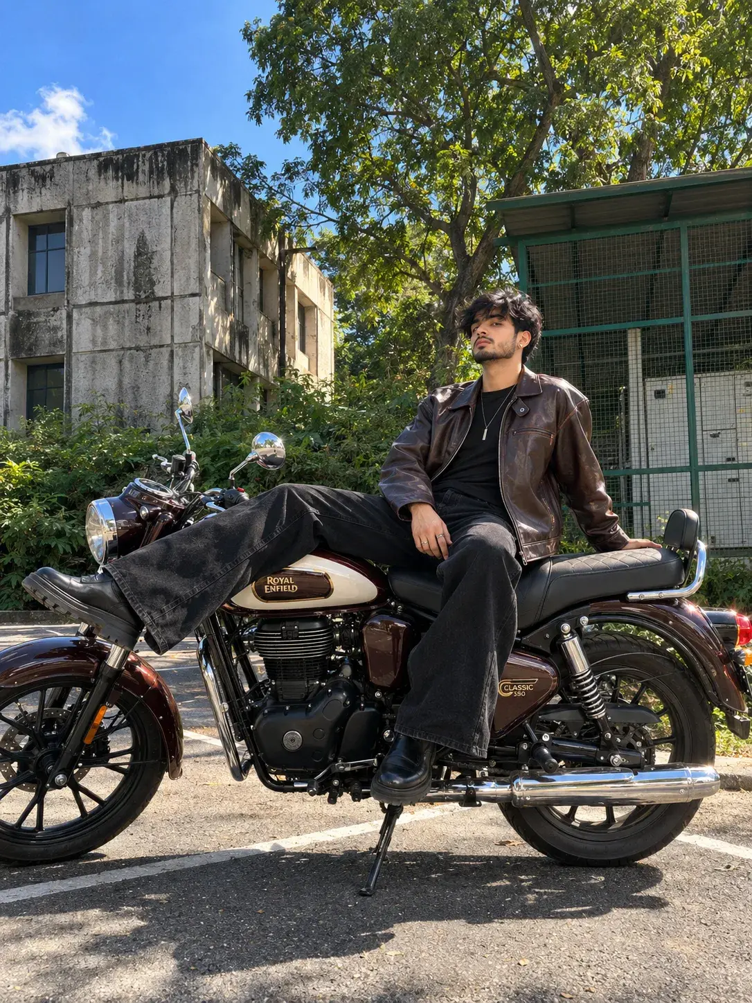 Full Body Vertical Portrait Of A Young Man With Royal Enfield