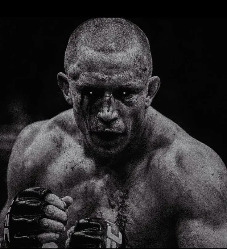Gritty High-Contrast Monochrome Combat Portrait Of Intense Male Fighter With Shaved Buzz Cut And Black Mma Gloves