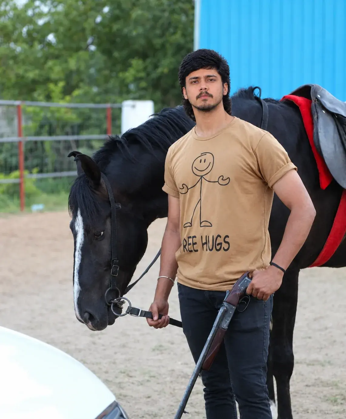 Man With Black Horse – Outdoor Equestrian Portrait