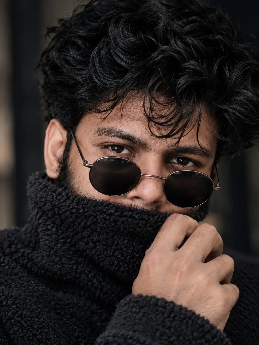 Moody Curly-Haired Man In Dark Sunglasses & Turtleneck