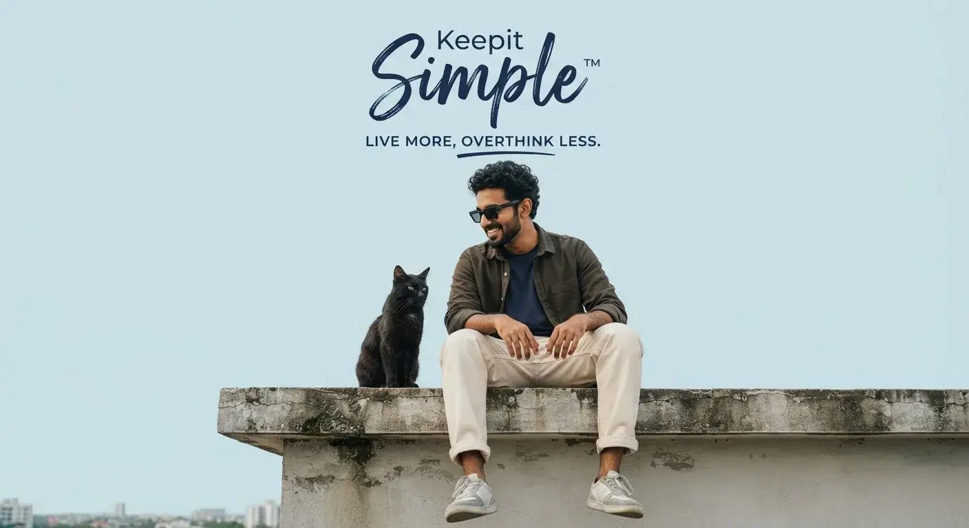 Portrait Of A Young South Asian Man Sitting Casually On The Edge.
