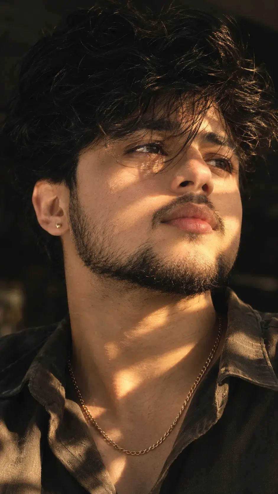 Prompt: Golden Sunlight – Moody Cinematic Male Portrait