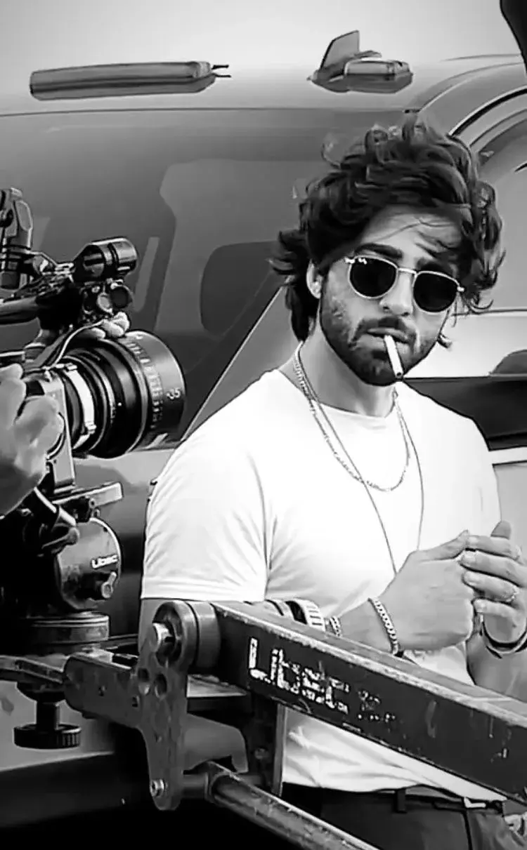 Smoke Between Takes: B&w Portrait Beside A Cinema Rig