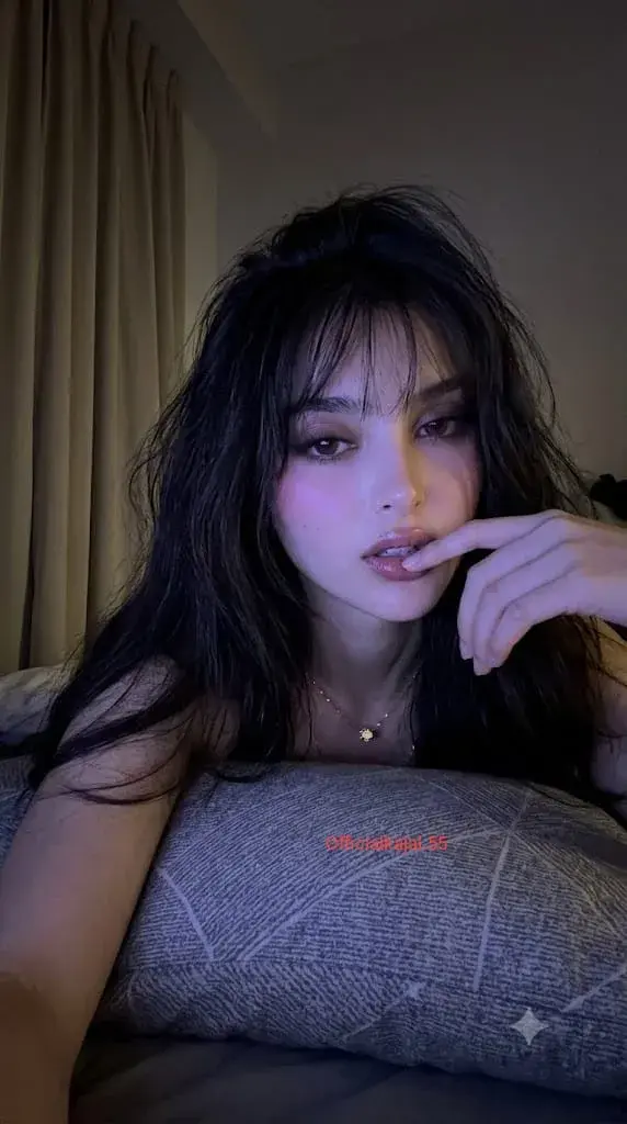Vertical, Realistic Low-Light Phone Selfie