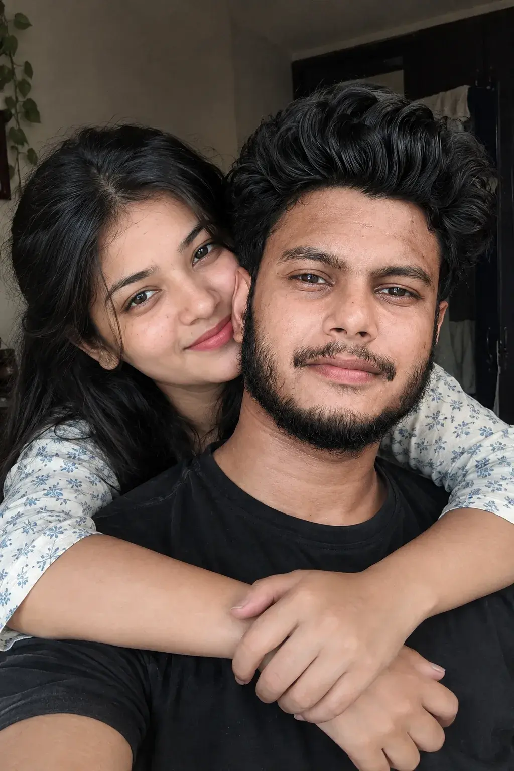 Young Loving Couple Cuddling Indoors, Embraced From